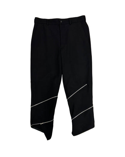Black CDG asymmetric hem zipper pants